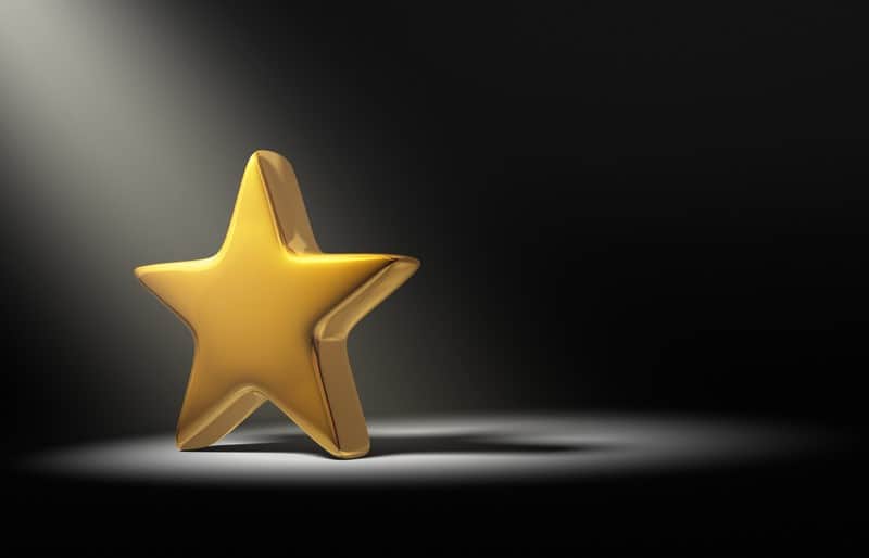 gold star on a black background
